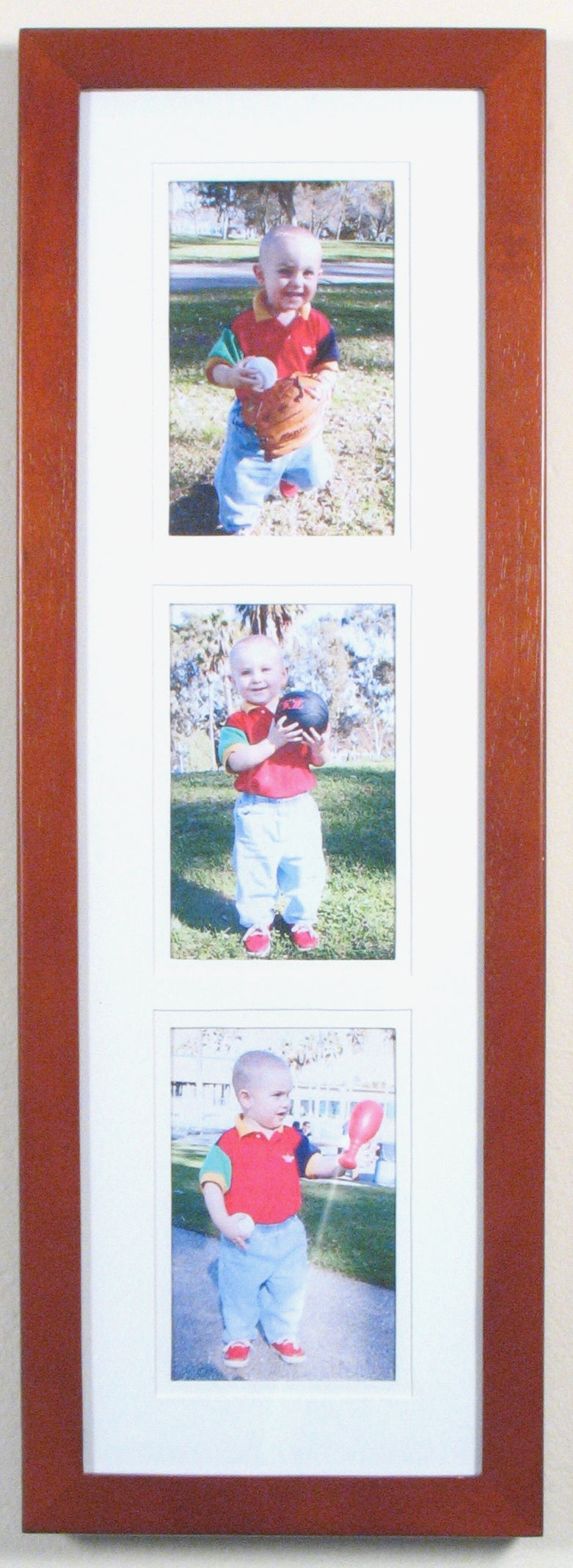Wooden frame with Cherry finish available with white on white mat. 